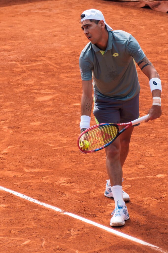 Alejandro Tabilo prepares to serve during an ATP Tour match