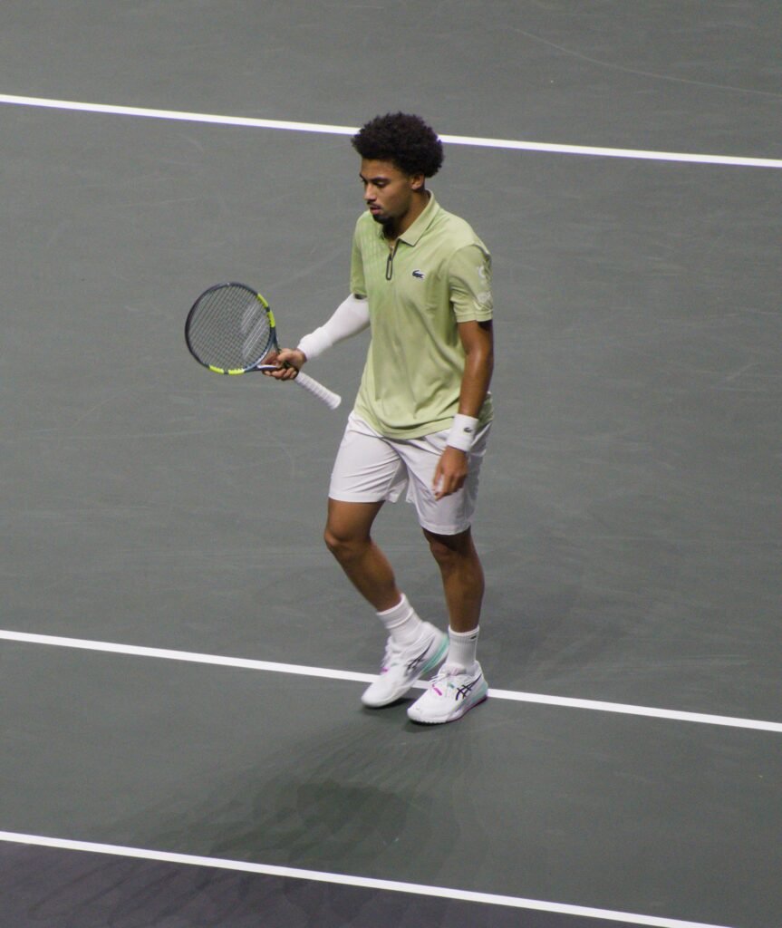 Arthur Fils on court during his first-round match against Alex de Minaur at the Rotterdam ATP 500 2026