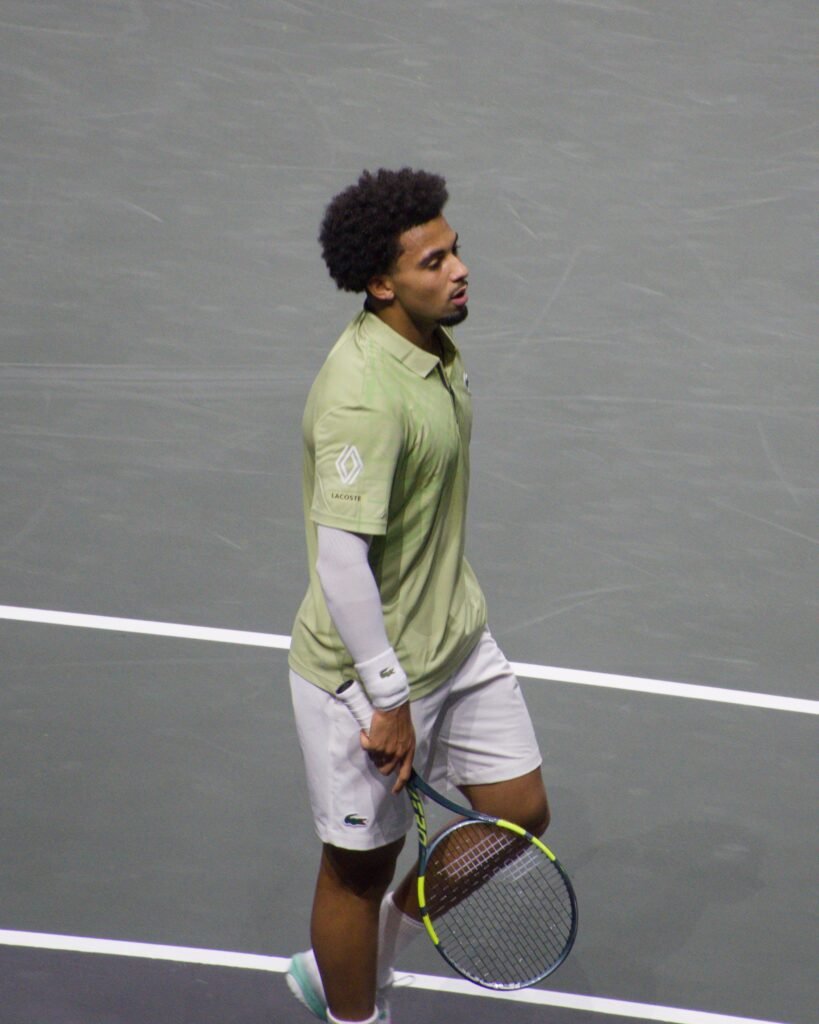Arthur Fils on court during his first-round match against Alex de Minaur at the Rotterdam ATP 500 2026