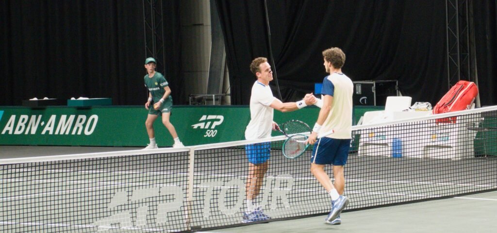 Roberto Carballés Baena and Pablo Carreño Busta shake hands after their match at the Rotterdam ATP 500 2026