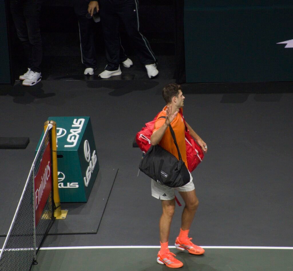 Hubert Hurkacz leaves the court after his first-round loss to Alexander Bublik at Rotterdam 2026