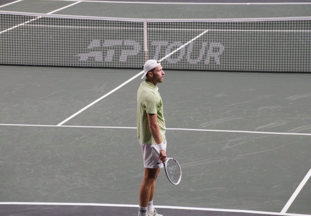 Hugo Grenier on court during Rotterdam ATP 500 2026 qualifying at Ahoy Arena