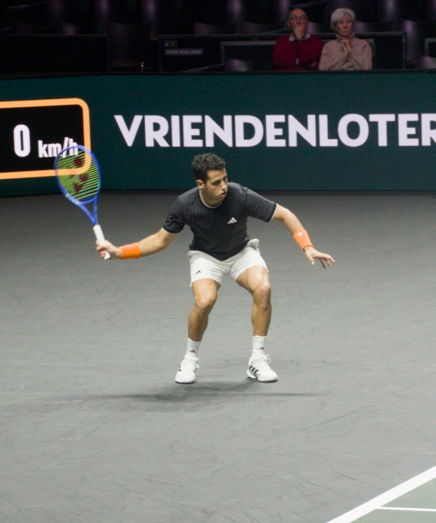 Jaume Munar hits a forehand during his match against Karen Khachanov at Rotterdam 2026.