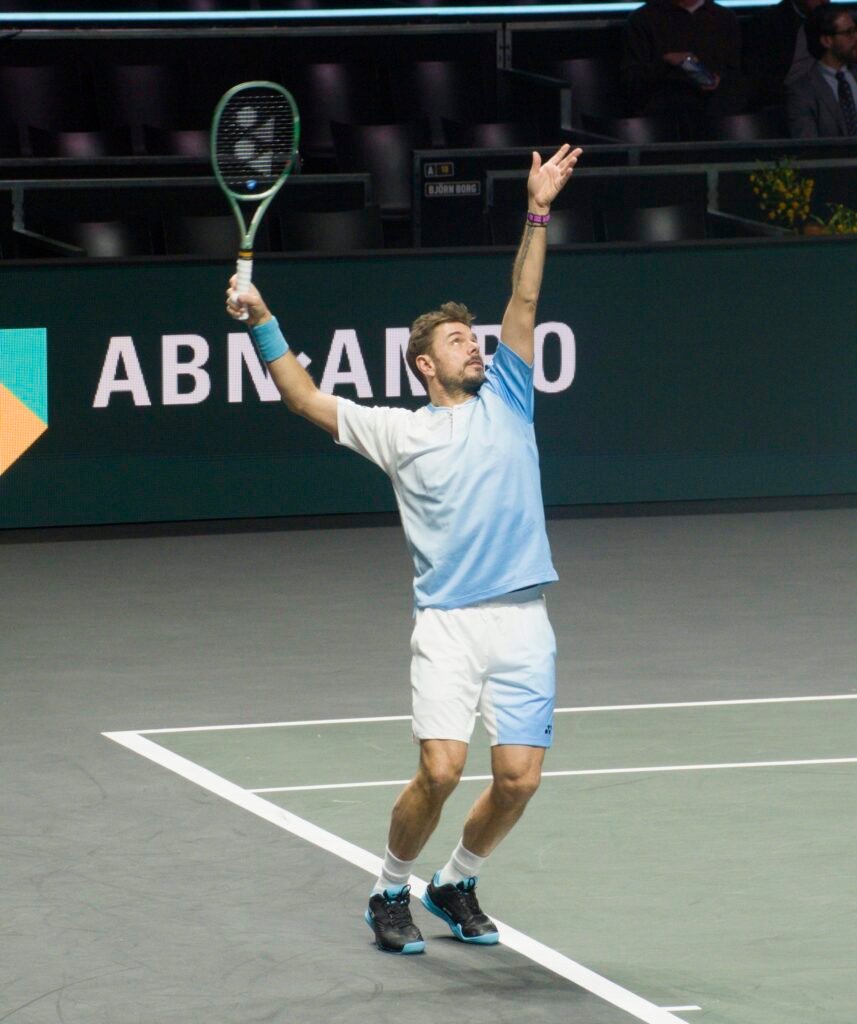 Stan Wawrinka serves during his second-round match against Alex de Minaur at the ABN AMRO Open in Rotterdam 2026.