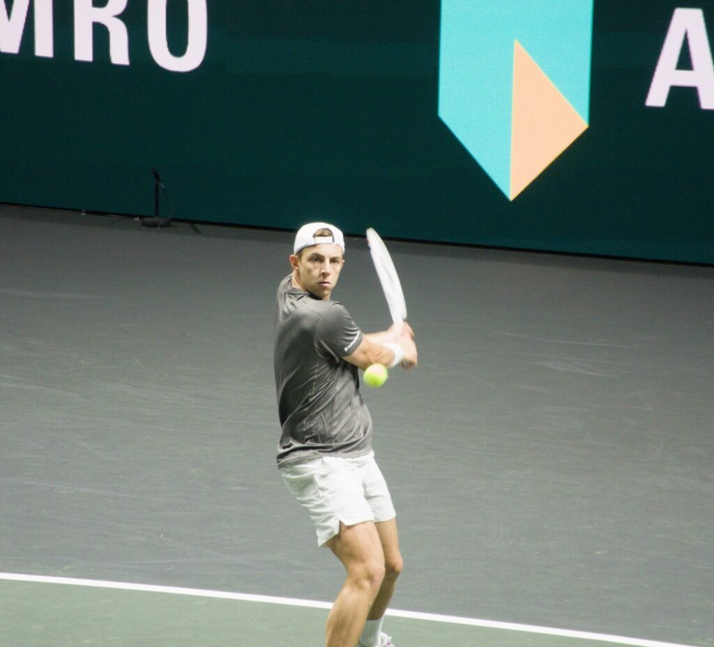 Tallon Griekspoor hits a backhand during his first-round match against Giovanni Mpetshi Perricard at the Rotterdam ATP 500 2026