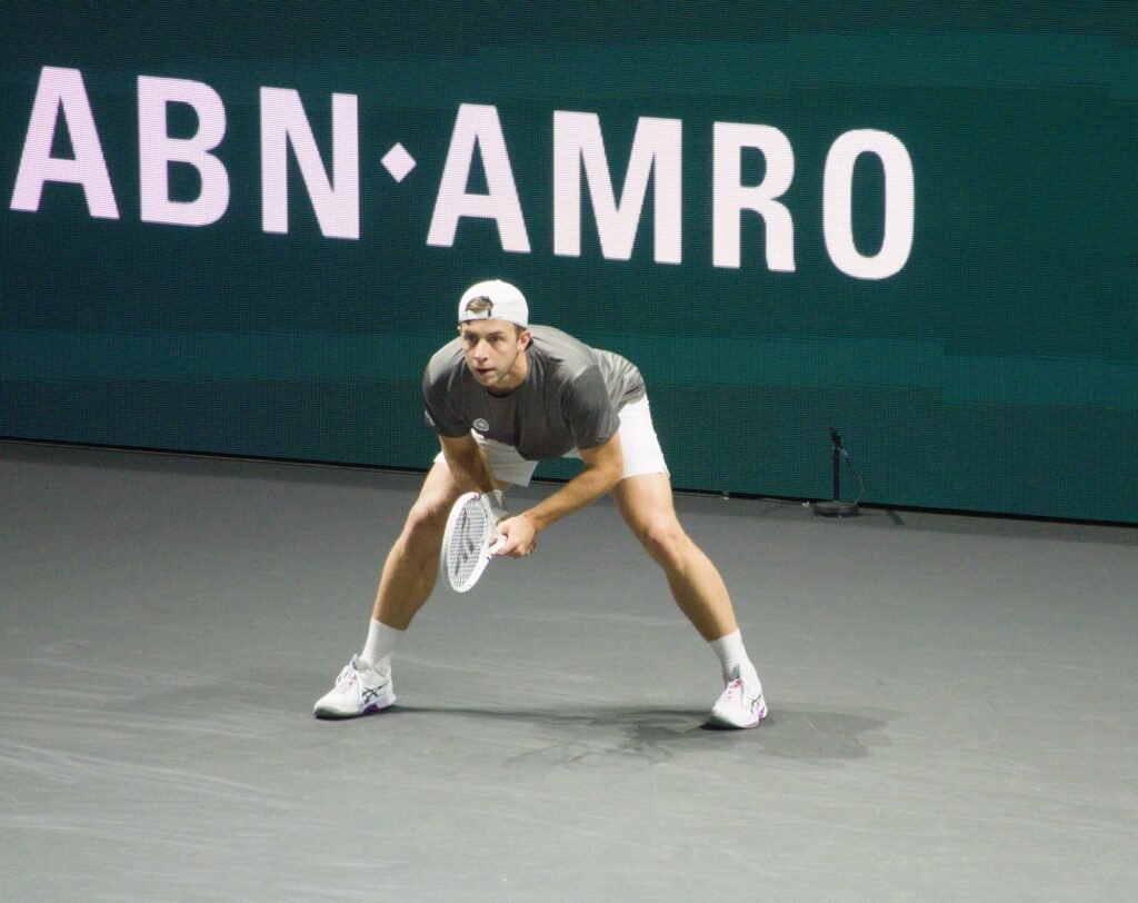 Tallon Griekspoor prepares to return serve during his first-round match against Giovanni Mpetshi Perricard at the Rotterdam ATP 500 2026