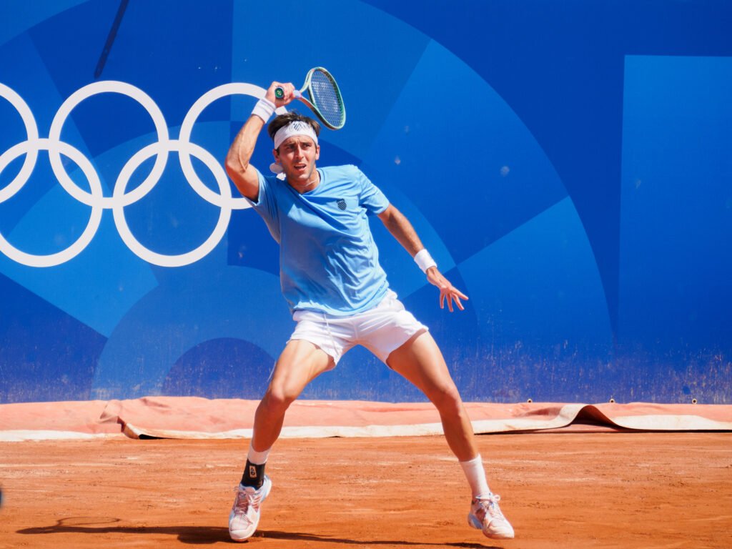 Tomás Martín Etcheverry hits a forehand during an ATP Tour match