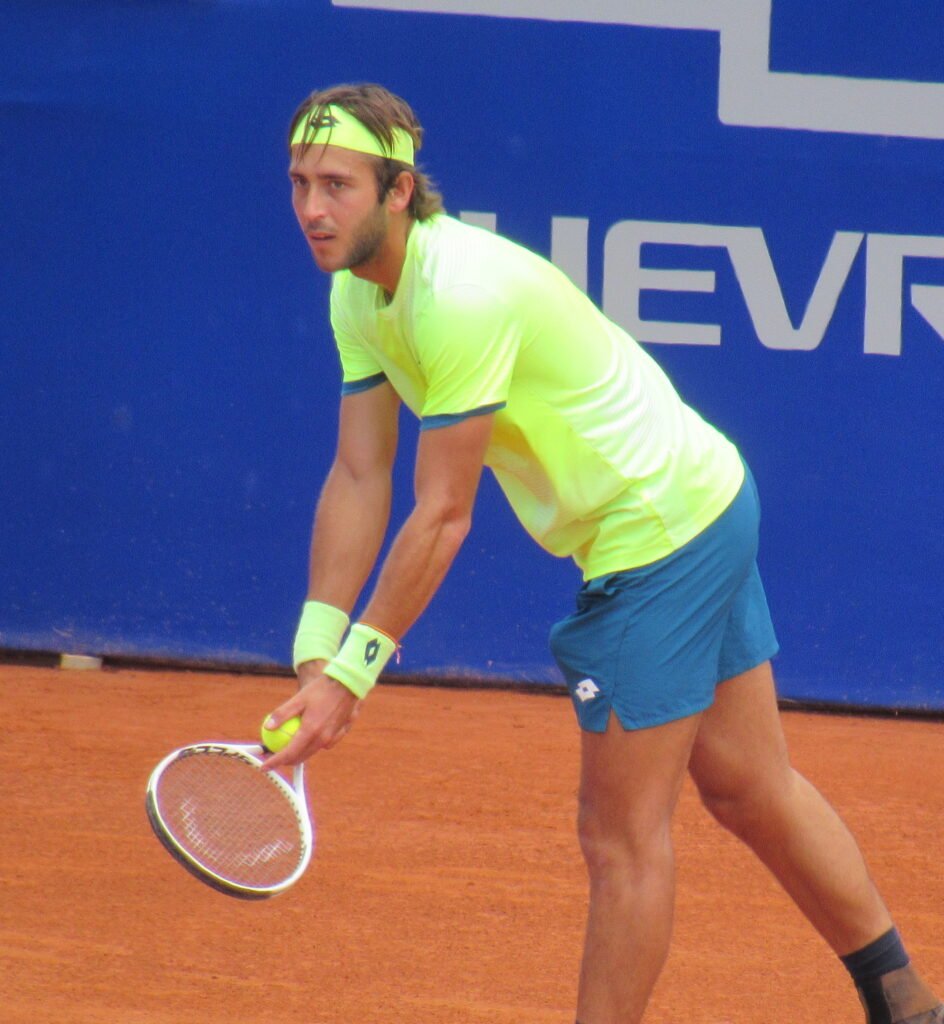 Tomás Martín Etcheverry prepares to serve during an ATP Tour match