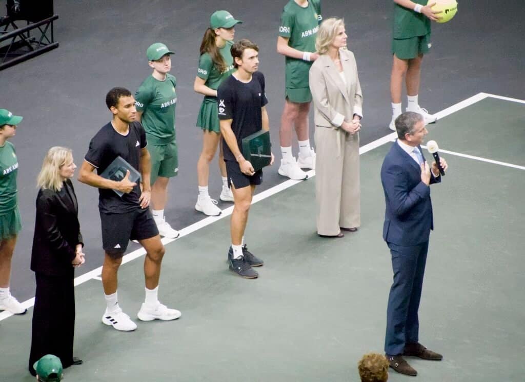 Tournament director Richard Krajicek addresses crowd and finalists during Rotterdam ATP 500 2026 final ceremony with players and staff.