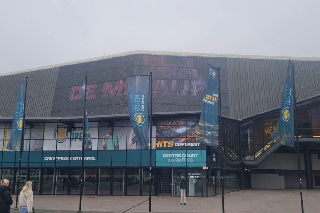 Rotterdam Ahoy arena exterior with Alex de Minaur banner on Day 5 (quarter-finals day) of the ABN AMRO Open 2026 ATP 500 tournament.