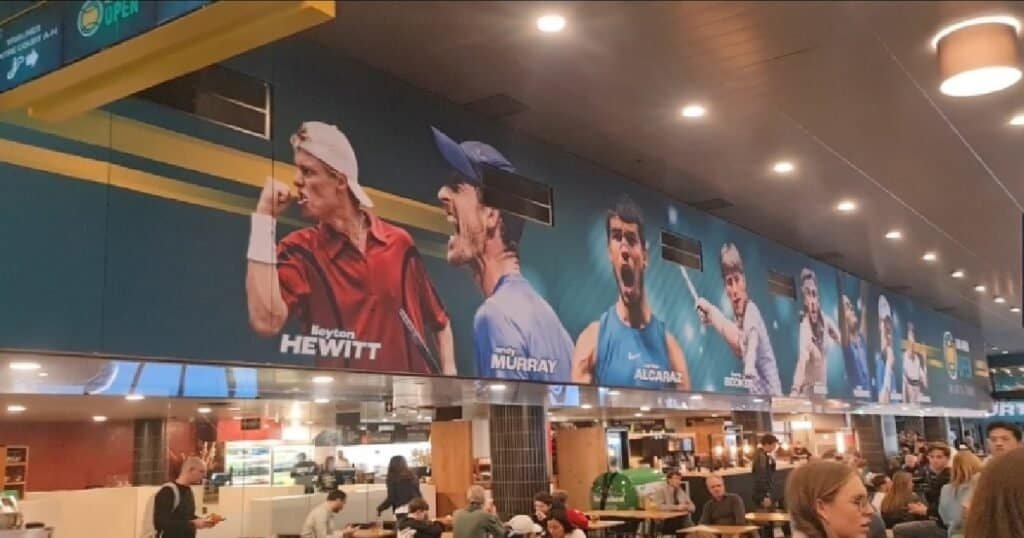 Player wall featuring Alex de Minaur and others at Rotterdam Ahoy arena during the ABN AMRO Open 2026 semi-final day (Day 6).