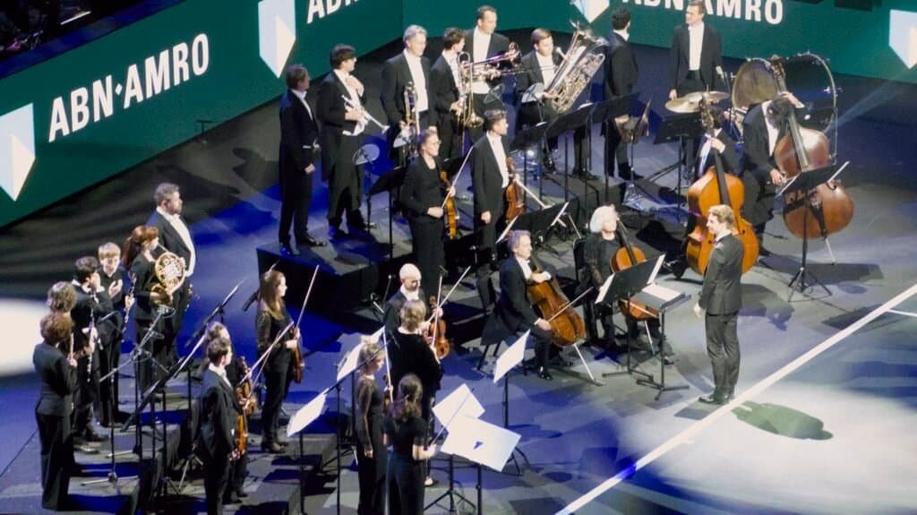 Orchestra performs during pre-match ceremony before Rotterdam ATP 500 2026 final at Ahoy Arena.