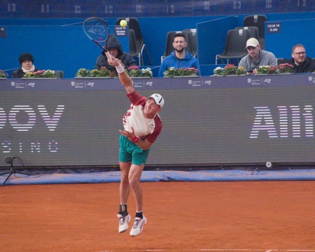 Romanian tennis player Filip Cristian Jianu in a ready stance during his match against Damir Dzumhur