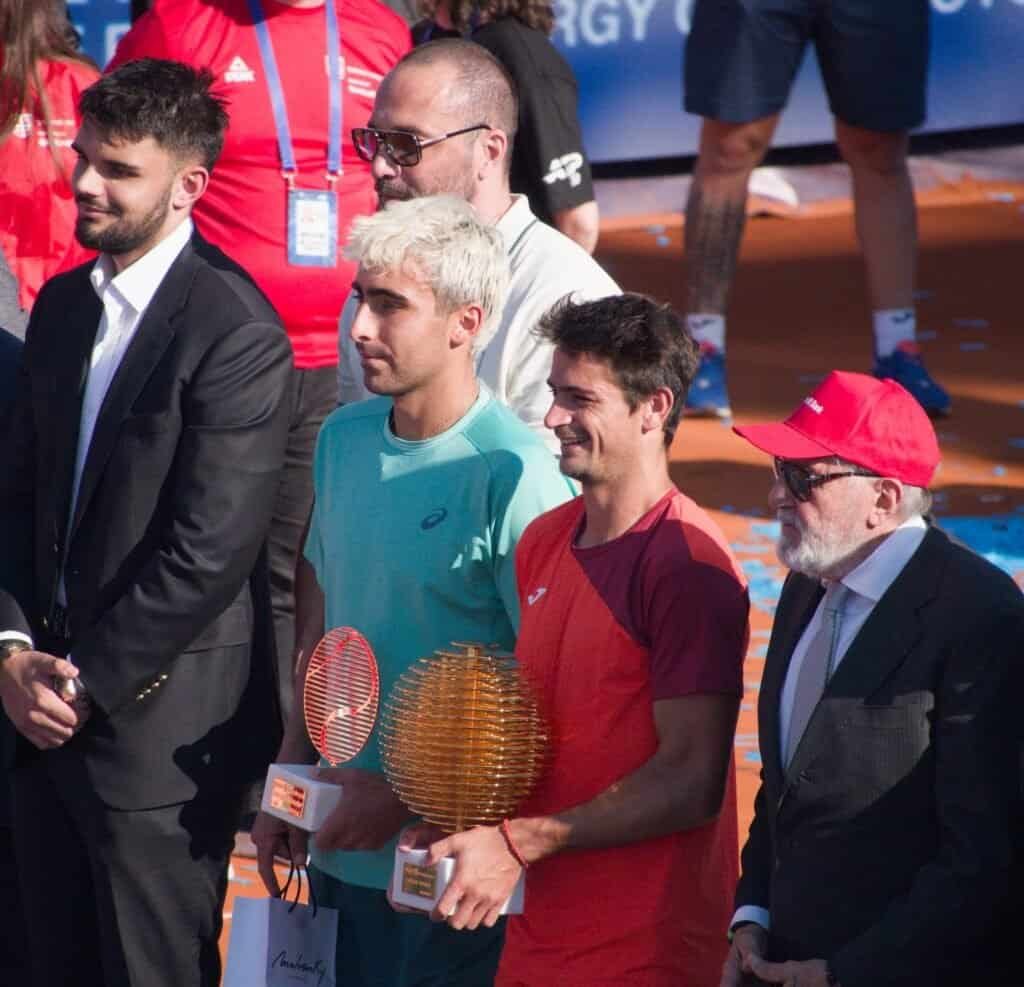 Mariano Navone and Daniel Merida with their trophies alongside Ion Tiriac during the Bucharest Open 2026 award ceremony