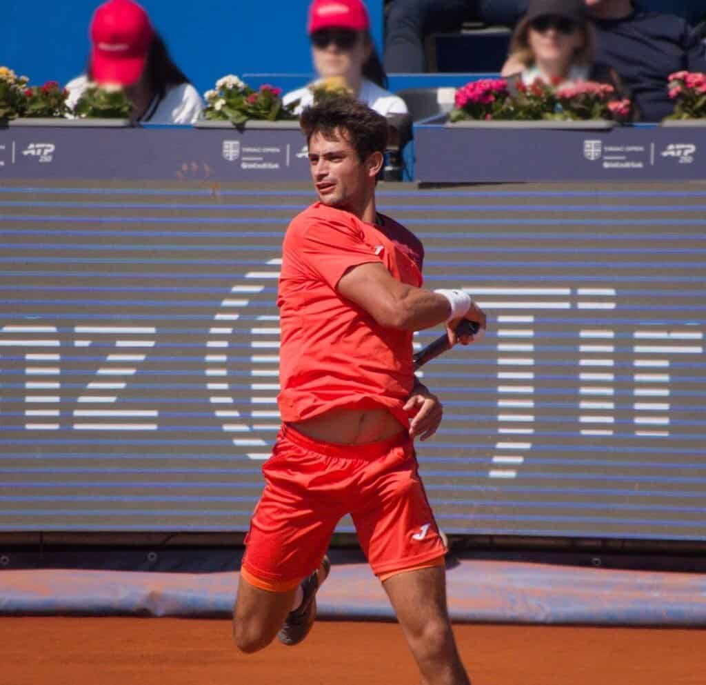 Mariano Navone hitting a powerful forehand shot during the Tiriac Open 2026 in Bucharest