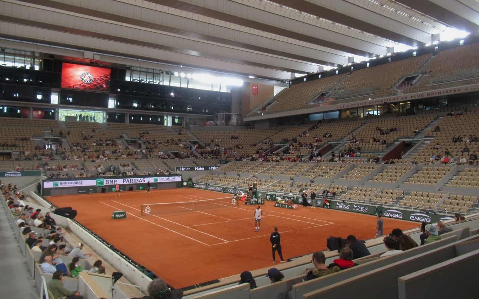 Inside view of the Court Philippe-Chatrier stadium with closed roof at Roland Garros in Paris.