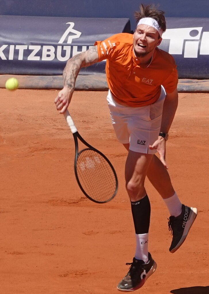 Kazakh tennis player Alexander Bublik hitting a forehand during his final match in Kitzbuhel on clay