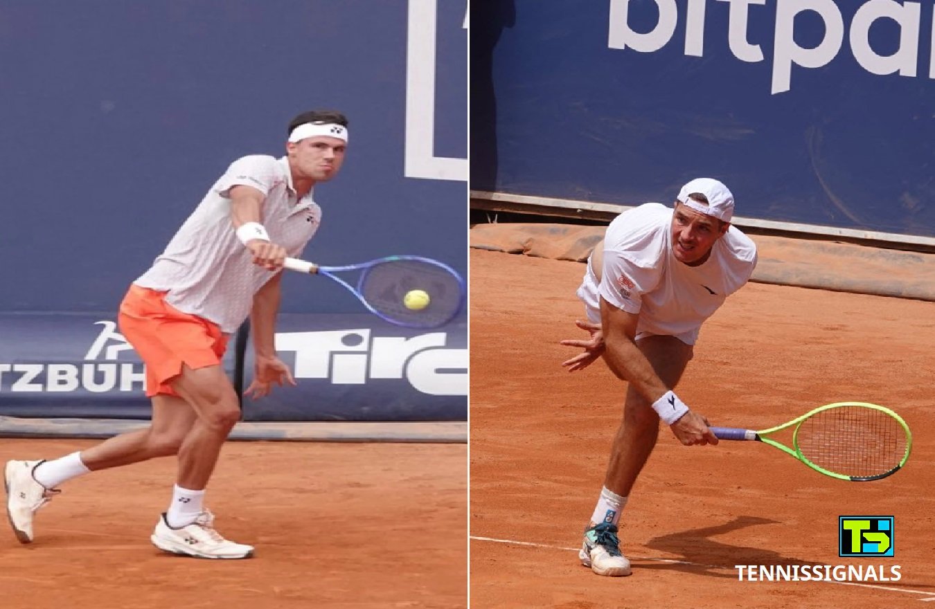 Daniel Altmajer igra forhend i Jan-Lenard Štruf u akciji na šljaci tokom ATP meča u Kicbilu
