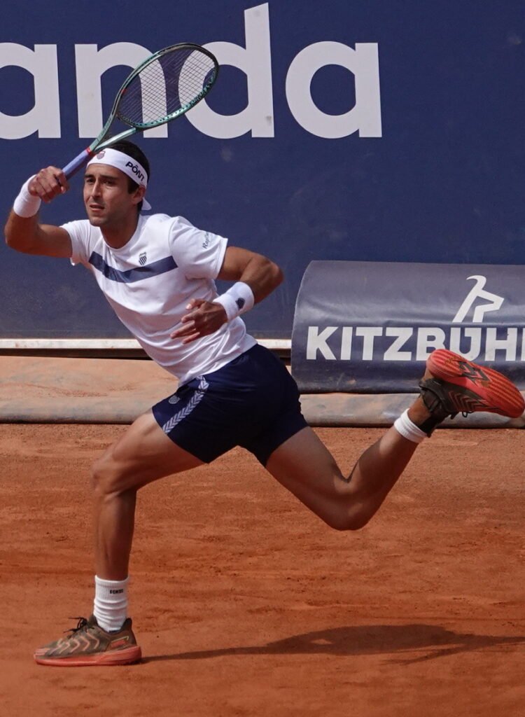 Argentine tennis player Maritin Etcheverry hitting a forehand during his quarterfinal match in Kitzbuhel on clay