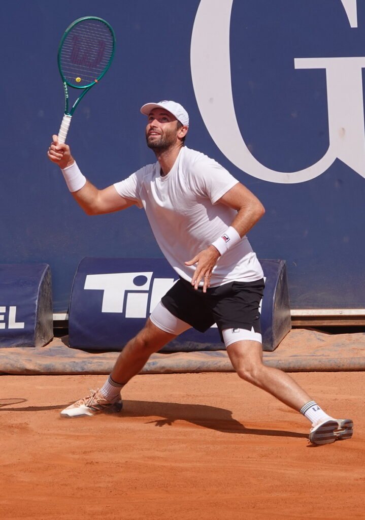 French tennis player Quentin Halys hitting a forehand during his quarterfinal match in Kitzbuhel on clay