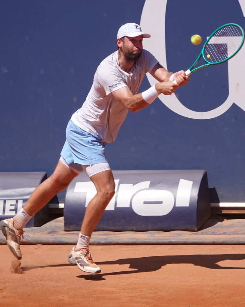 French tennis player Quentin Halys hitting a forehand during his final match in Kitzbuhel on clay