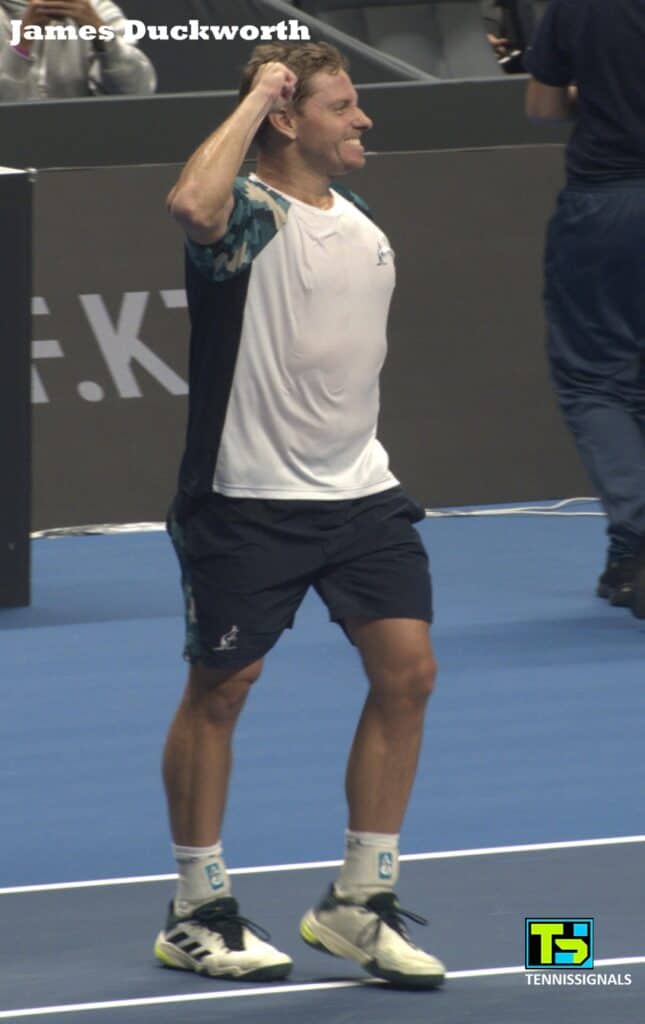 James Duckworth celebrating his victory with a clenched fist against Luciano Darderi in the second round of the Almaty tournament.