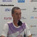 Mikhail Kukushkin answering questions at the press conference during the ATP Almaty Open 2026 tournament.